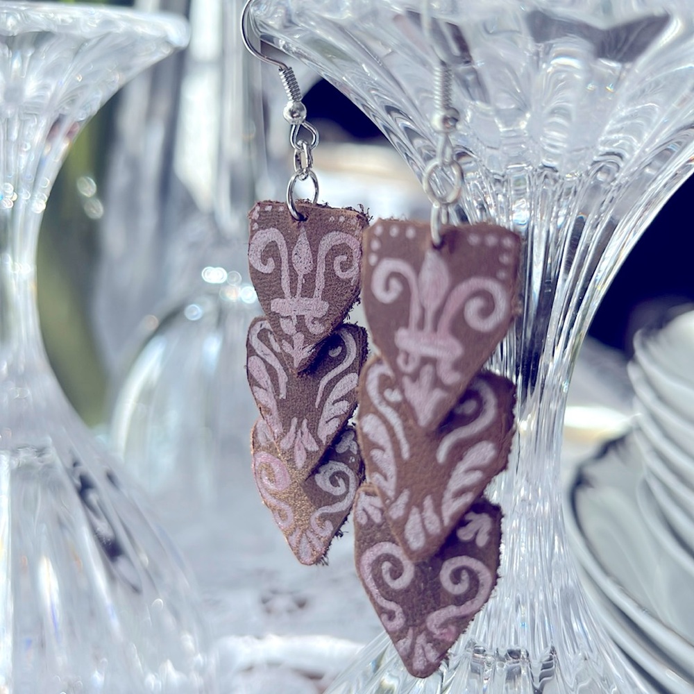 Beautifully hand painted leather earrings!